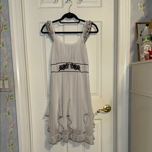 Chic White Midi Dress with Black Detailing